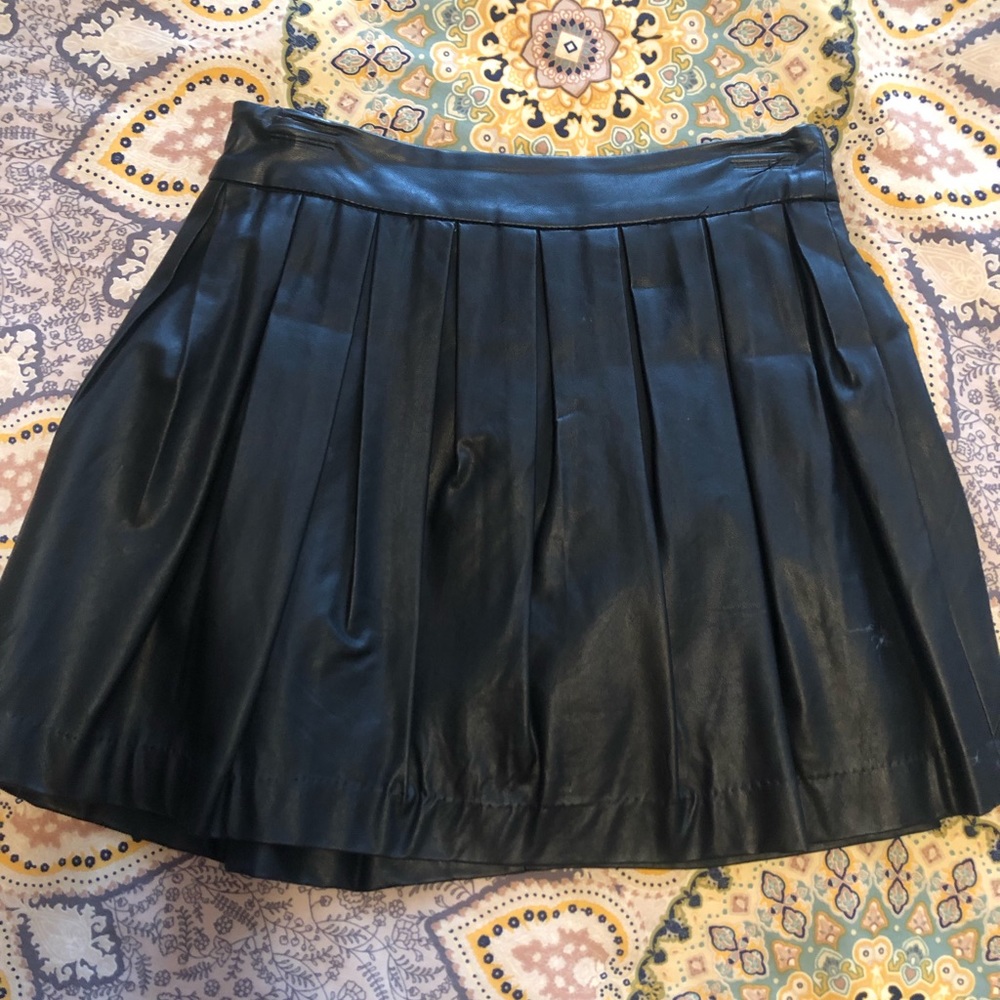 Adorable black pleated skirt.